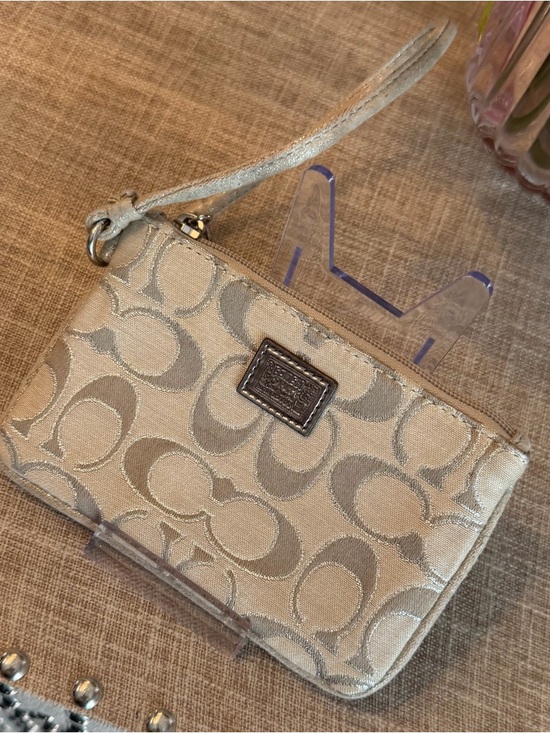 Coach Handbags - Coach EUC Silver Signature Wristlet Pouch